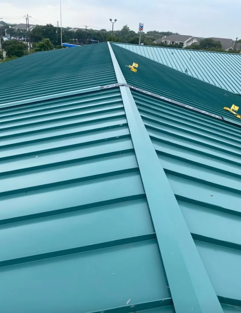 Green commercial metal roof ridge and valley for Metal Roof Repair in Leighton